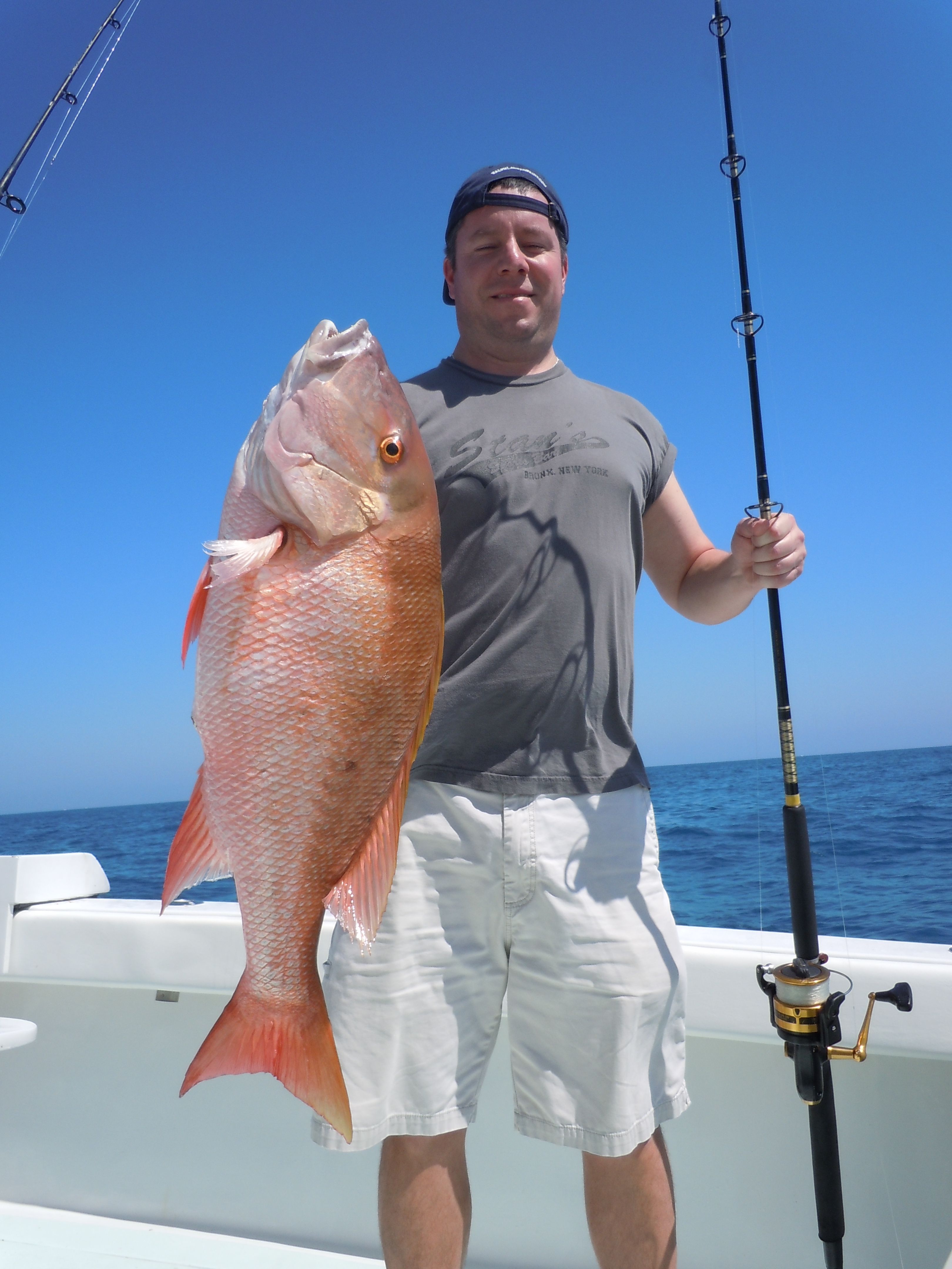 Customer and mutton snapper in key west